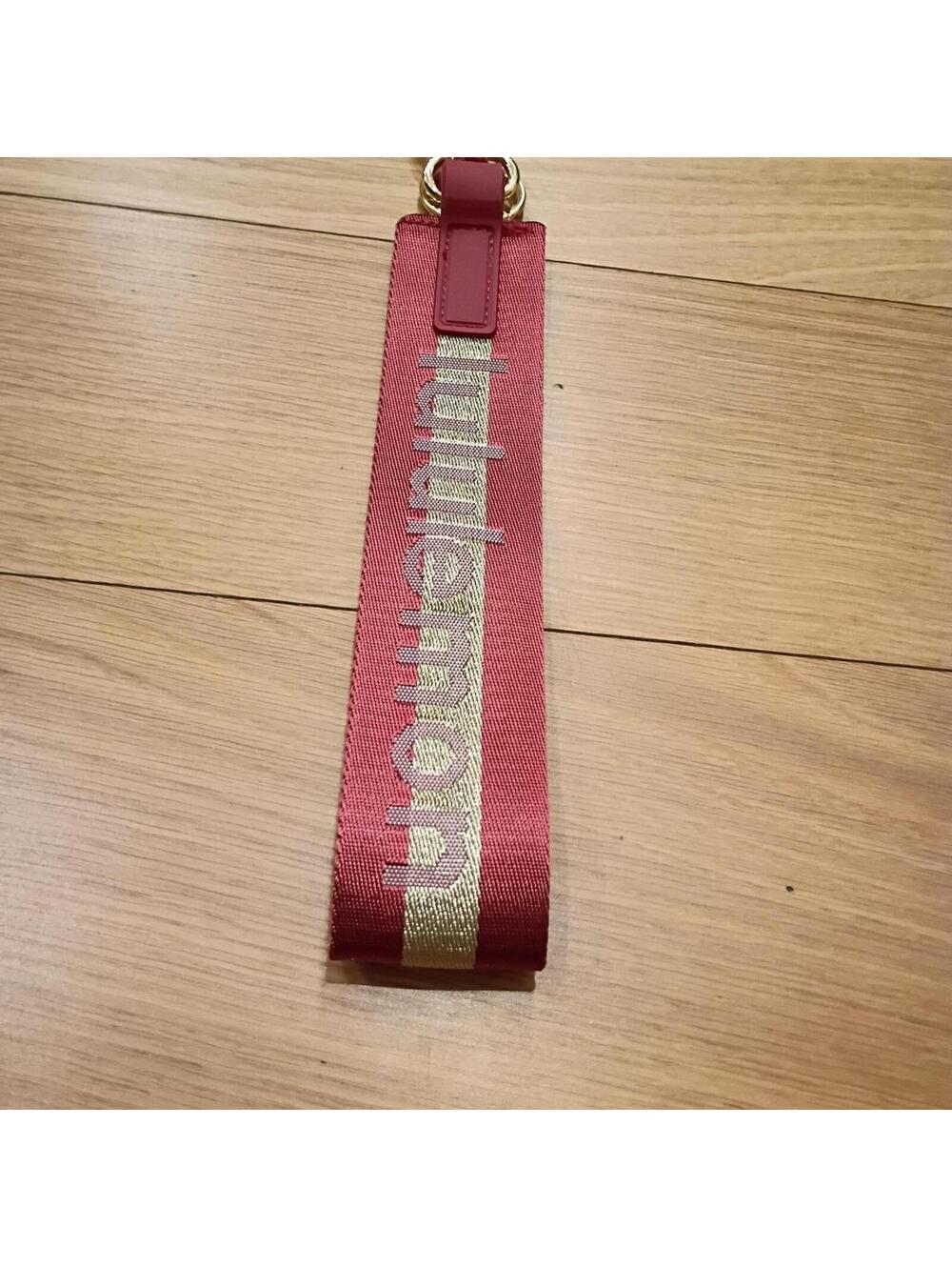 Lululemon Women's Red and Gold never lost keychain
